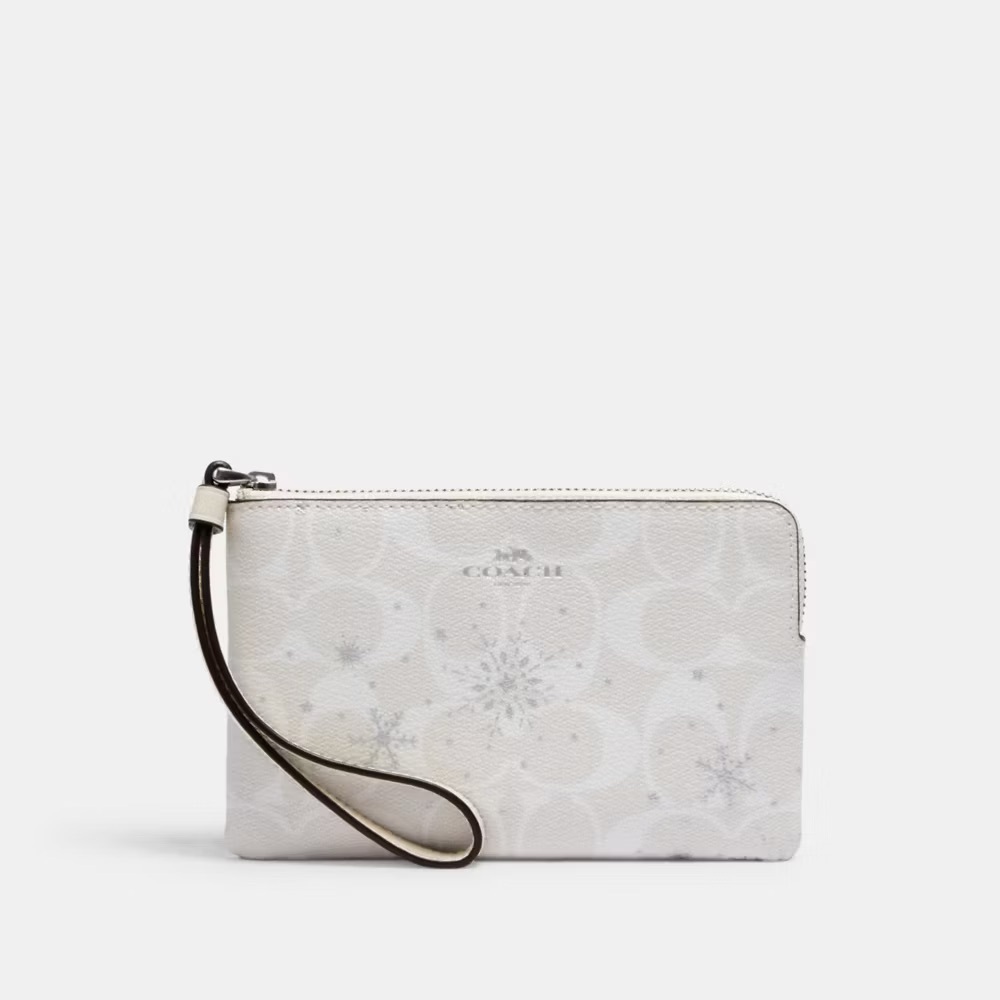 NWT Coach Signature C White and Silver Snowflake Wristlet